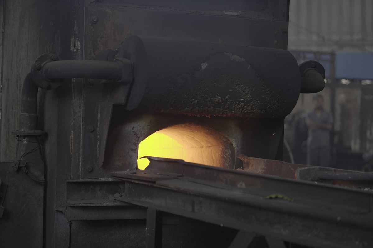 Glowing furnace mouth in the forging shop at our works